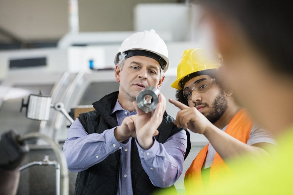 Employees working on operational excellence on the job site