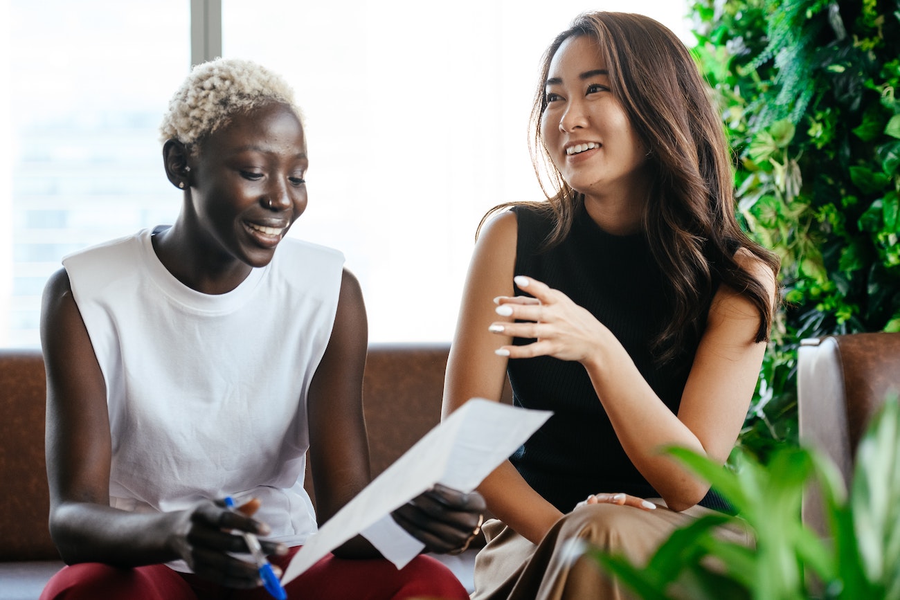 employees smiling and talking