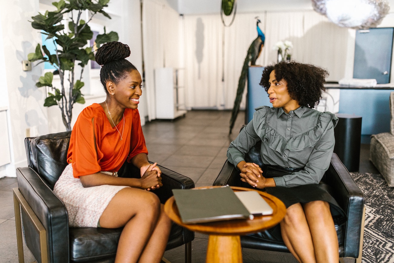 Two employees talking